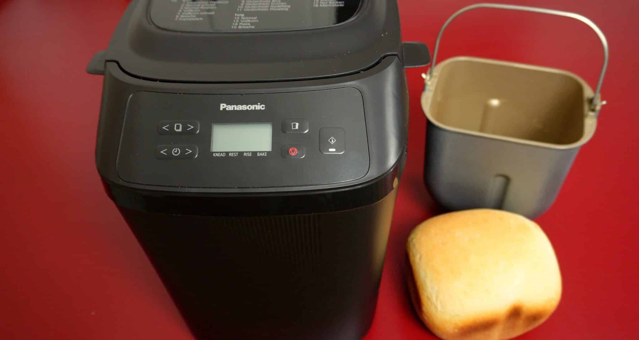 Panasonic SD-PN100 with its baking pan and a fresh compact loaf